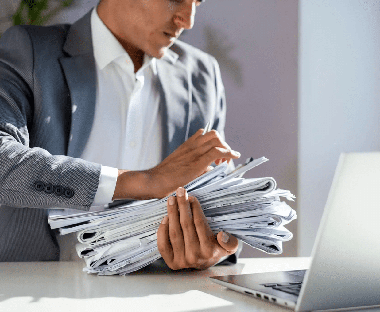 Businessman organizing paperwork